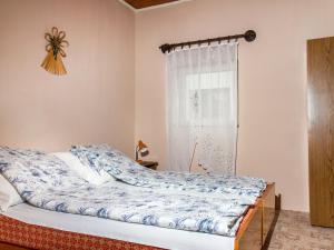 Posteľ alebo postele v izbe v ubytovaní Holiday Home Johnny by Interhome