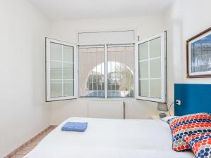 Postel nebo postele na pokoji v ubytování Holiday Home Residencia Marítima by Interhome