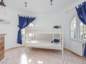 Postel nebo postele na pokoji v ubytování Holiday Home Residencia Marítima by Interhome