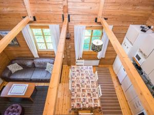 an overhead view of the living room of a tiny house at Holiday Home Miilu by Interhome in Iitti +17 photos