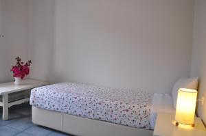 Voodi või voodid majutusasutuse Zefiros Traditional Hotel toas