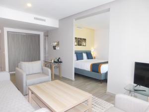 Postel nebo postele na pokoji v ubytování Gardenia Boutique Hotel