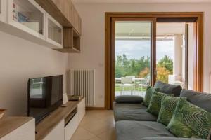 TV a/nebo společenská místnost v ubytování Casa Giulia