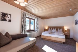 Postel nebo postele na pokoji v ubytování Apartments Foidl