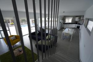 A television and/or entertainment centre at Casa Achaman - Contemporary style villa with outstanding views