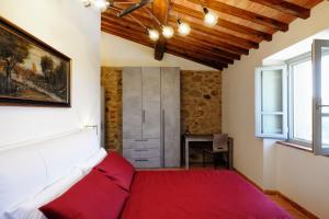 Postel nebo postele na pokoji v ubytování Chimera Tuscany Resort