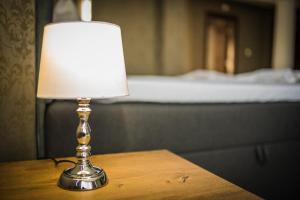 A bed or beds in a room at Vida Family Hotel
