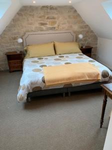 Uma cama ou camas num quarto em Brittany Vacation Rental