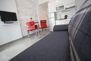 Kuchyňa alebo kuchynka v ubytovaní House Duce (850)