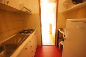 Kuchyňa alebo kuchynka v ubytovaní Apartment 75-3