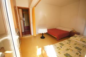 Posteľ alebo postele v izbe v ubytovaní Apartment 75-3