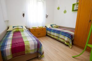 Posteľ alebo postele v izbe v ubytovaní Apartments Vrbnik (879)