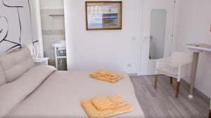 Postel nebo postele na pokoji v ubytování Villa Priscilla