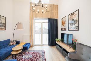 Posedenie v ubytovaní Mrągowo dwupoziomowy Apartament Indygo 85m2 z widokiem na jezioro