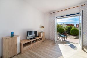 TV a/nebo společenská místnost v ubytování Guesthouse Brist (610)