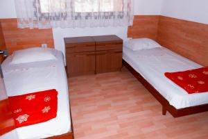 Krevet ili kreveti u jedinici u okviru objekta Apartments BISERKA (4232)