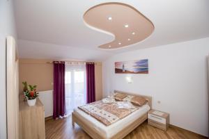 Posteľ alebo postele v izbe v ubytovaní House Lopar (73)