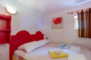 Ένα ή περισσότερα κρεβάτια σε δωμάτιο στο House Stivan (4239)