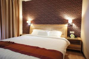 Postel nebo postele na pokoji v ubytování Hotel Balik Pulau