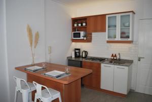 Kuchyň nebo kuchyňský kout v ubytování Chic & bright apartment in Recoleta