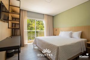 Ένα ή περισσότερα κρεβάτια σε δωμάτιο στο Grand Suítes Family Resort by Atlantica