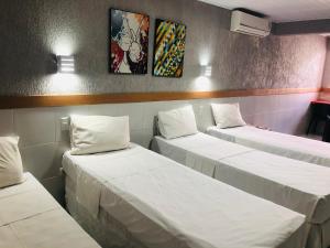Cama ou camas em um quarto em Inter Hotel