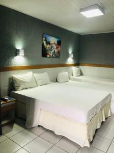 Cama ou camas em um quarto em Inter Hotel