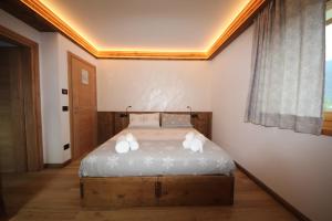 Een bed of bedden in een kamer bij Belvedere