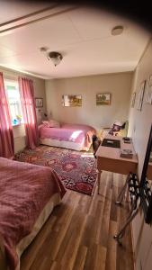 Postel nebo postele na pokoji v ubytování Skogsbrynet B&B, Bredsjö Nya Herrgård