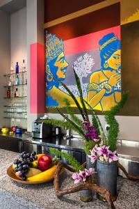 a table with fruits and vegetables in a kitchen at Villa Shanti - Heritage Hotel for Foodies in Puducherry