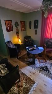 Area soggiorno di Skogsbrynet B&B, Bredsjö Nya Herrgård