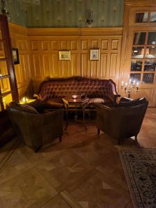 Area soggiorno di Skogsbrynet B&B, Bredsjö Nya Herrgård