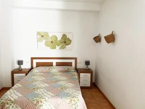 A bed or beds in a room at Apartamentos Villaaltea - Bella