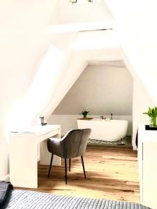 Zona de estar de Das Stader Loft mit Sonnenbalkon