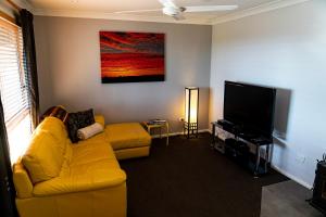 
A television and/or entertainment center at Maric Park Cottages
