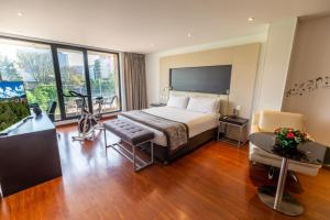 Postel nebo postele na pokoji v ubytování Hotel Jazz Apartments