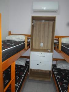 Poschodová posteľ alebo postele v izbe v ubytovaní Flat Winterville Residens