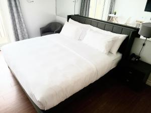 Posteľ alebo postele v izbe v ubytovaní Horizon 777