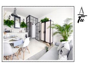 a living room with a couch and a dining room at A morze TU in Gdynia +31 photos