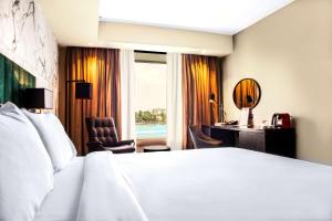 Posteľ alebo postele v izbe v ubytovaní Radisson Blu Anchorage Hotel