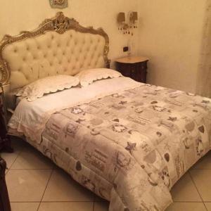 מיטה או מיטות בחדר ב-Napoli Forever