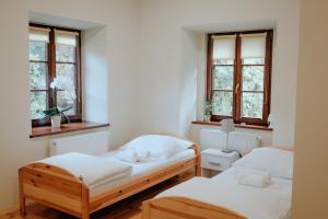 Tempat tidur dalam kamar di Zamkowa, Pokoje Gościnne