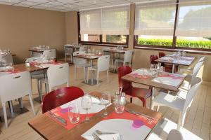 En restaurang eller annat matställe på Campanile Epinay sur Orge Savigny Sur Orge