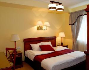Ein Bett oder Betten in einem Zimmer der Unterkunft Hotel Wilga by Katowice Airport