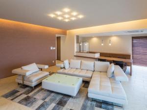 Posezení v ubytování Condominium T-Room