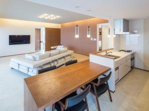Kuchyň nebo kuchyňský kout v ubytování Condominium T-Room