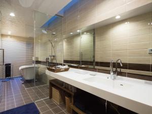 Koupelna v ubytování Condominium T-Room