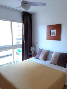 Postel nebo postele na pokoji v ubytování Albir Sunshine Apartments