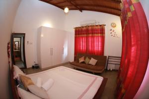 Postel nebo postele na pokoji v ubytování Colombo Orchid Villa