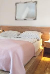 Llit o llits en una habitació de apartman SUPERKLASIKO